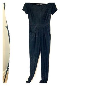 Black off the shoulder pants romper with pockets